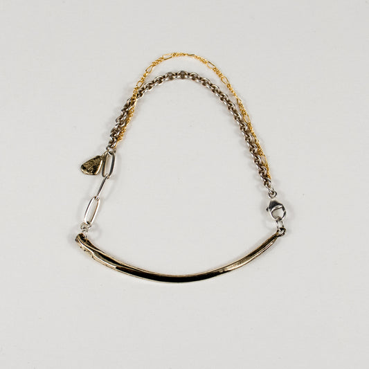 Arc charm measuring 2 inches in length available in reclaimed sterling silver or brass on a gold-filled and sterling mixed-chain bracelet handmade and finished in our Catskills store-studio