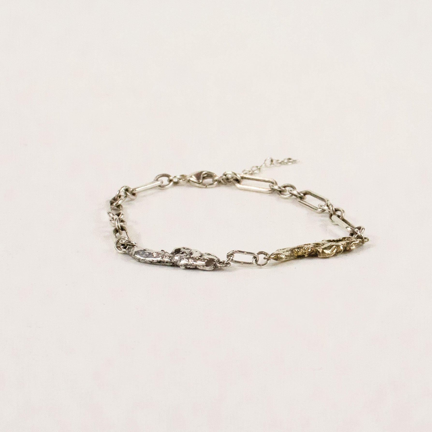 Sterling silver and brass seaweed pieces measuring 1 inch in length each on heavy sterling chain handmade and finished in our Catskills store-studio