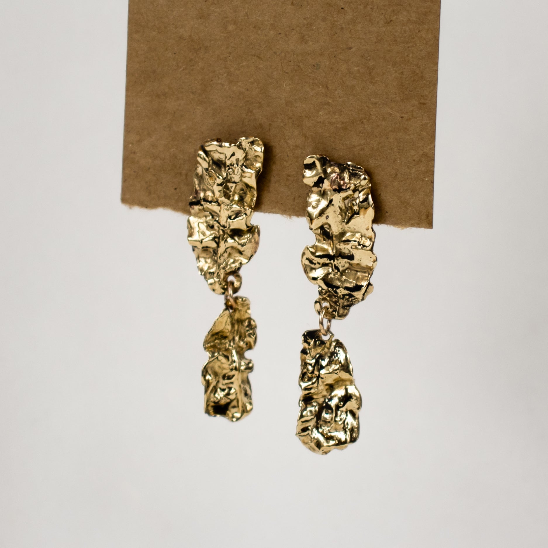 Reclaimed brass double-wave seaweed stud earrings measuring 2 inches in length with sterling silver posts handmade and finished in our Catskills store-studio