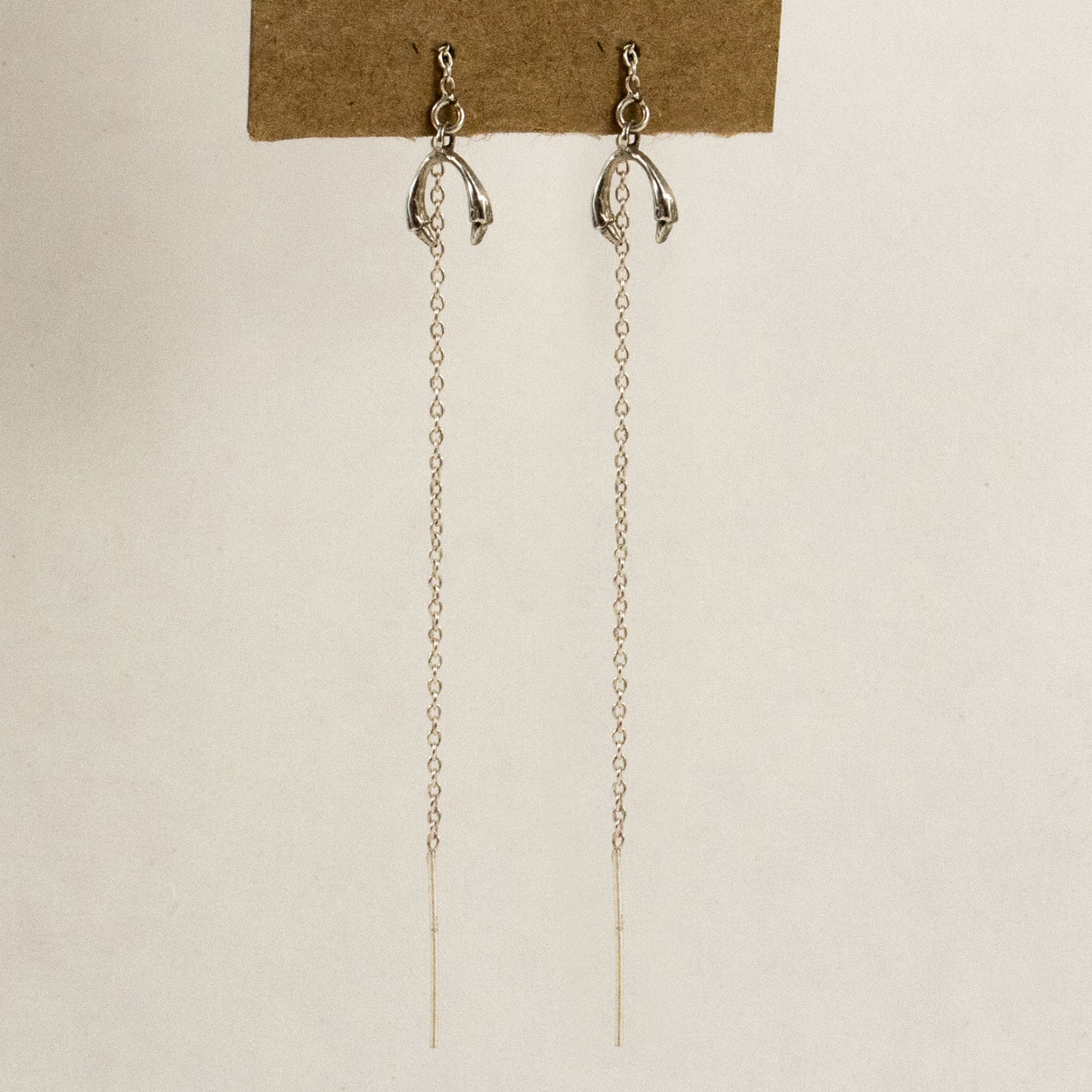 Solid reclaimed sterling silver horseshoe charms on sterling fine-chain threaders handmade and finished in our Catskills store-studio shown on model.