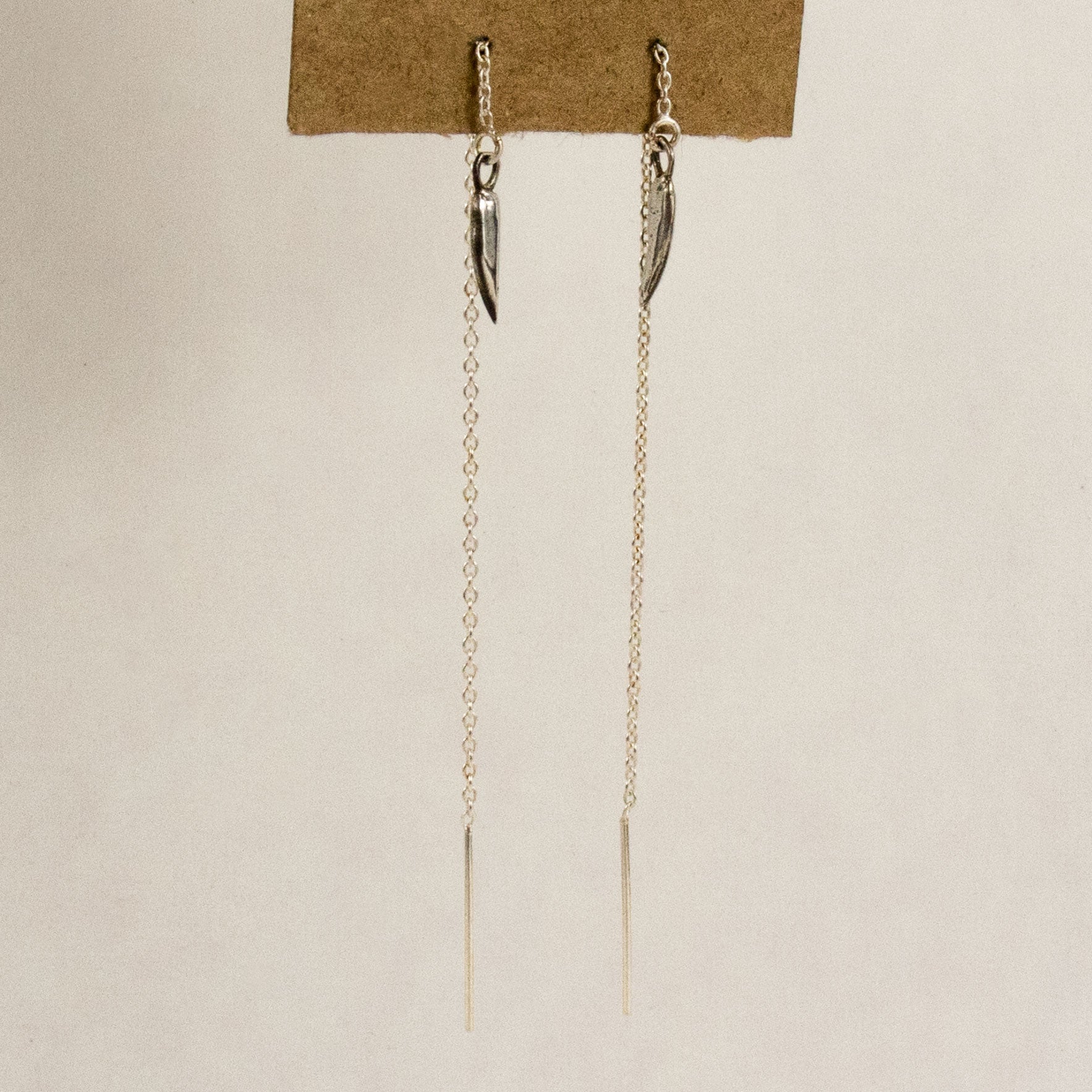 Solid reclaimed sterling silver claw charms on sterling fine-chain threaders handmade and finished in our Catskills store-studio and available as singles to mix-and-match