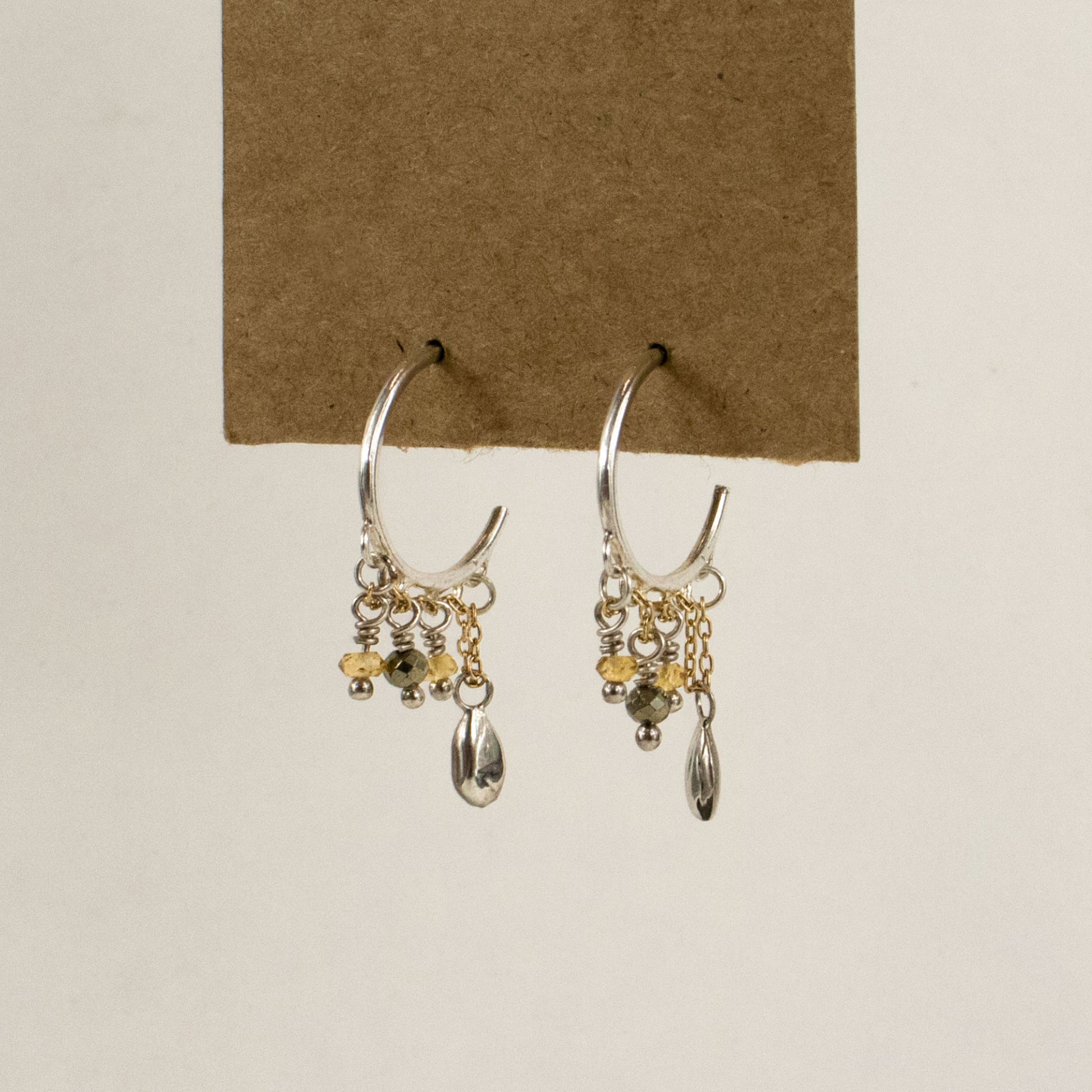 Solid reclaimed sterling silver seed and hoops threaded with gold-filled chain hand-beaded with citrine, labradorite and pyrite handmade and finished in our Catskills store-studio and available as singles to mix-and-match