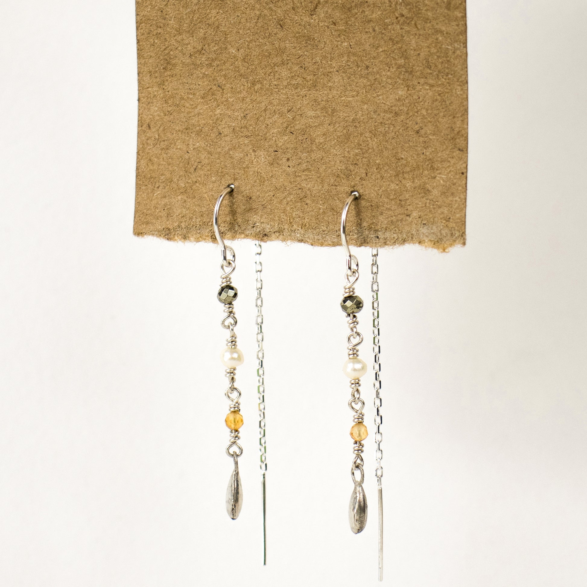 Reclaimed sterling silver and gold-filled wire threader earrings beaded with citrine, pyrite and one freshwater pearl and available with either 10k gold or sterling silver seed charms.