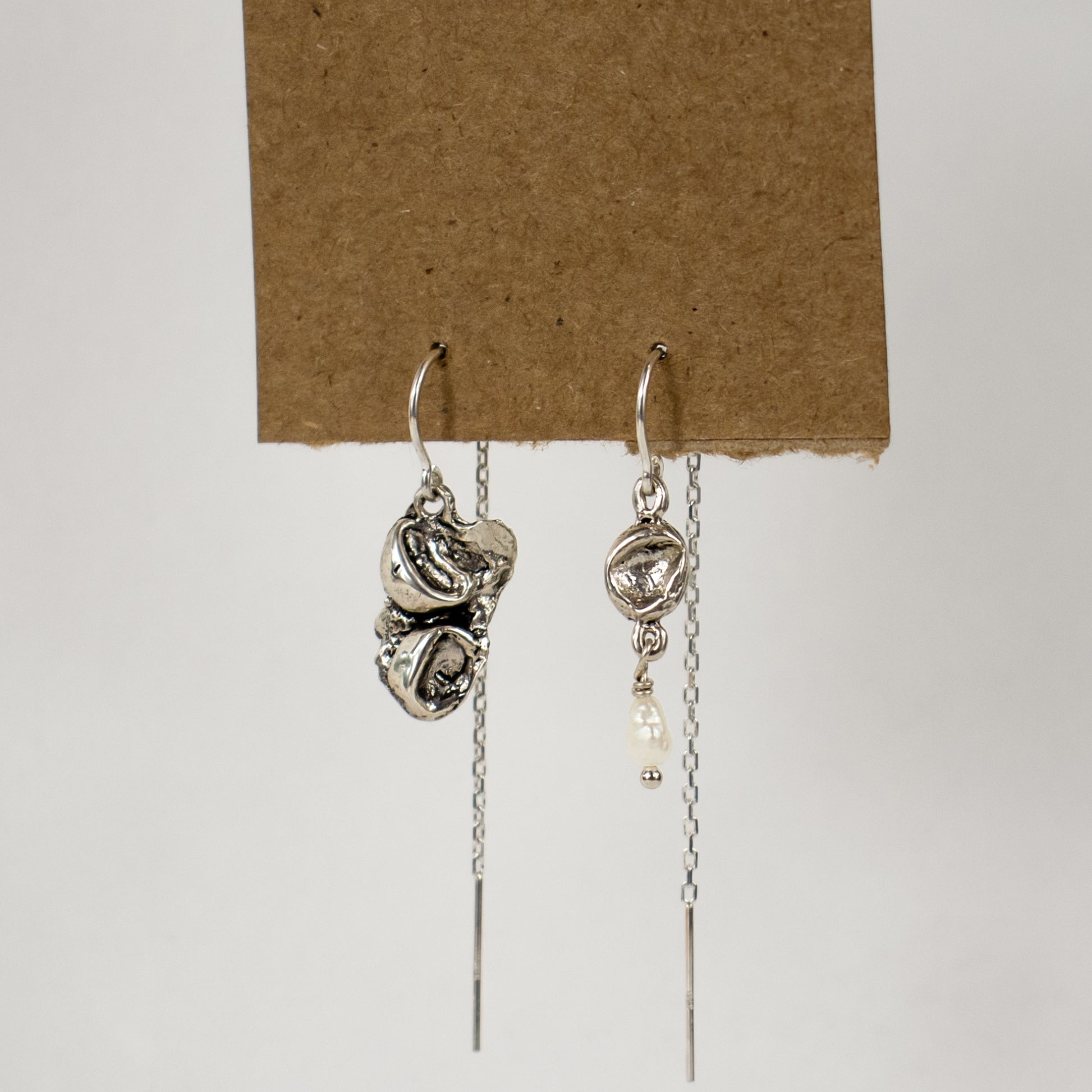 Reclaimed sterling silver or brass seaweed pods with a freshwater pearl drop dangling from sterling hooks and fine chain handmade and finished in our Catskills store-studio.