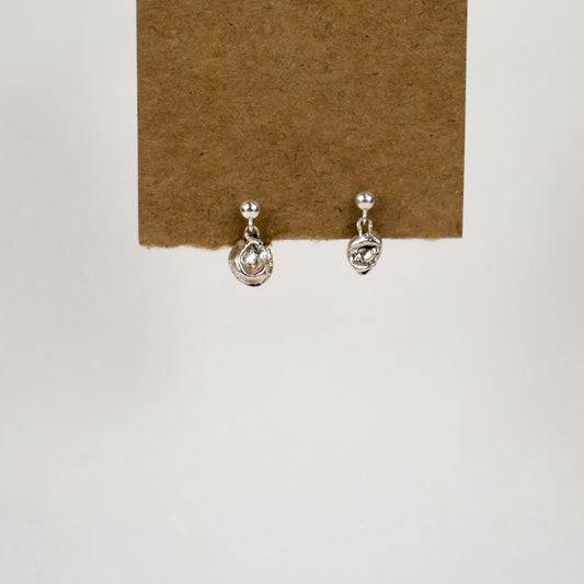 Small reclaimed sterling silver seaweed pods dangling from sterling studs handmade and finished in our Catskills store-studio