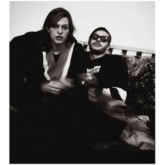 MILLA JOVOVICH & MARIO SORRENTI BY DREW JARRETT