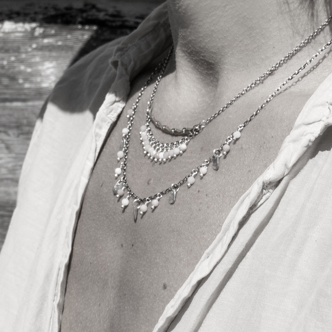 Reclaimed sterling silver 2 inch spine with hand-beaded fringe on sterling cable-chain adjustable 15 - 20 inches hand-beaded with your choice of chrysoprase, opal, watermelon tourmaline, aquamarine, moonstone, onyx, citrine, pyrite or labradorite. Handmade and finished in our Catskills store-studio shown on model.