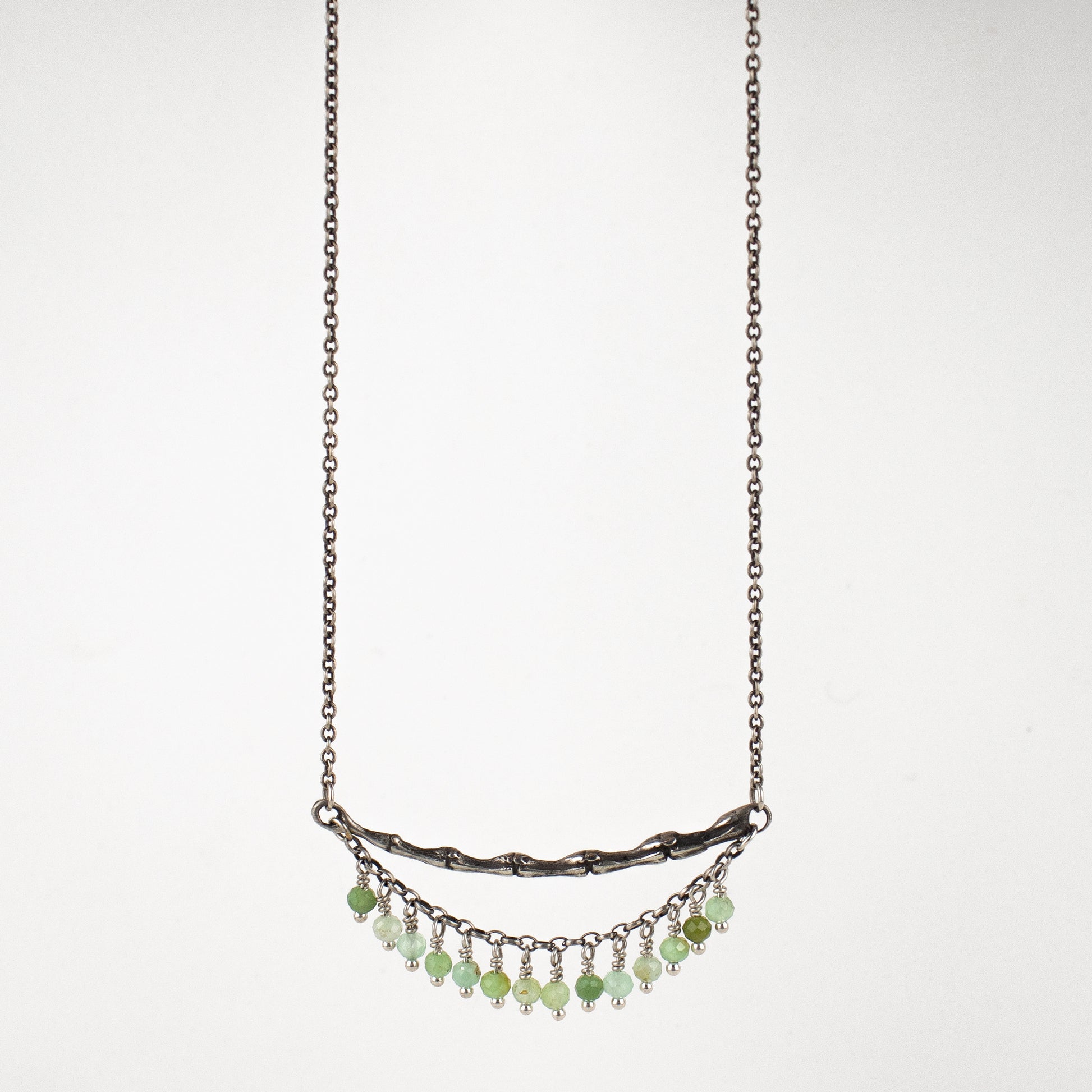 Reclaimed sterling silver 2 inch spine with hand-beaded fringe on sterling cable-chain adjustable 15 - 20 inches hand-beaded with your choice of chrysoprase, opal, watermelon tourmaline, aquamarine, moonstone, onyx, citrine, pyrite or labradorite. Handmade and finished in our Catskills store-studio.