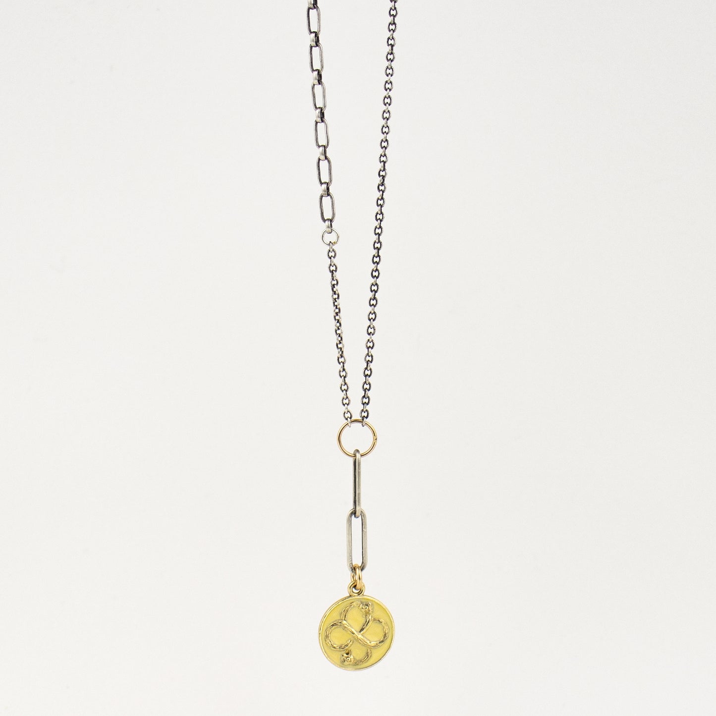 Solid reclaimed 10k gold Serpent Infinity Knot charm 15mm in diameter with your choice of black or lemon enamel on adjustable 16 - 18 inch sterling mixed-chain handmade and finished in our Catskills store-studio. Serpent symbolism can represent life and healing, and the infinite knot simplicity and balance.