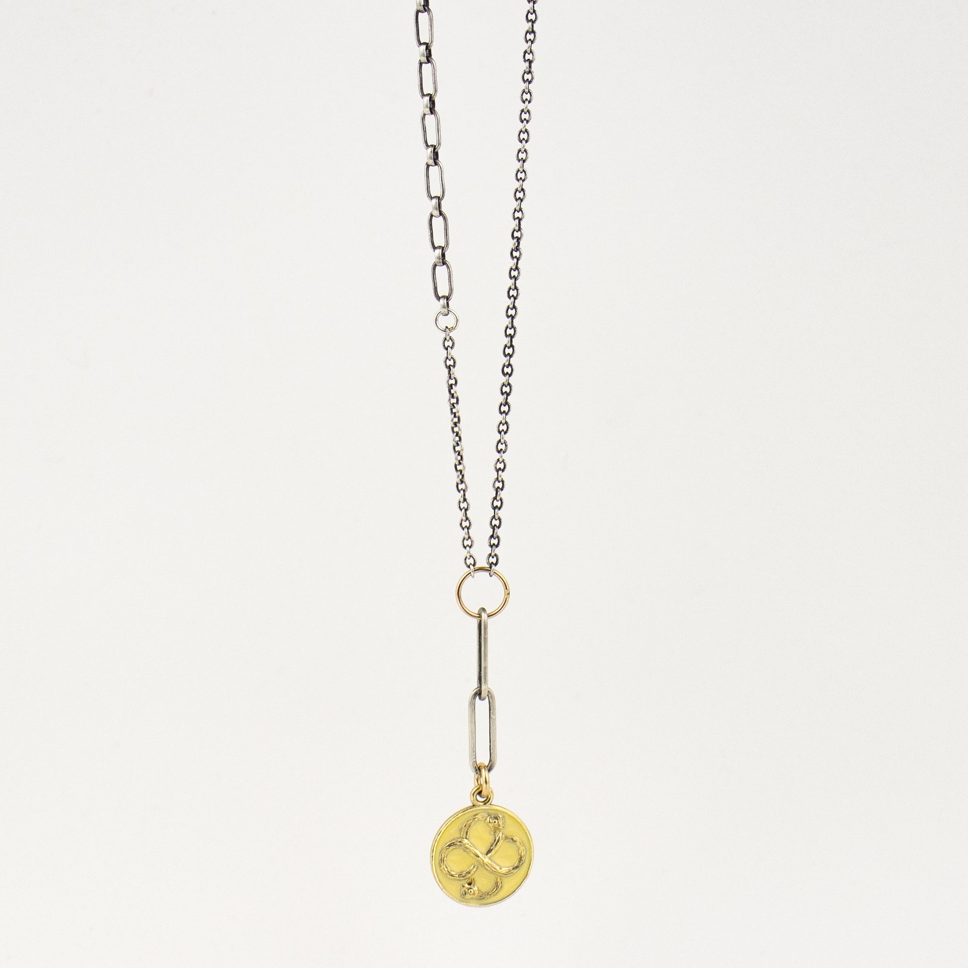 Solid reclaimed 10k gold Serpent Infinity Knot charm 15mm in diameter with your choice of black or lemon enamel on adjustable 16 - 18 inch sterling mixed-chain handmade and finished in our Catskills store-studio. Serpent symbolism can represent life and healing, and the infinite knot simplicity and balance.