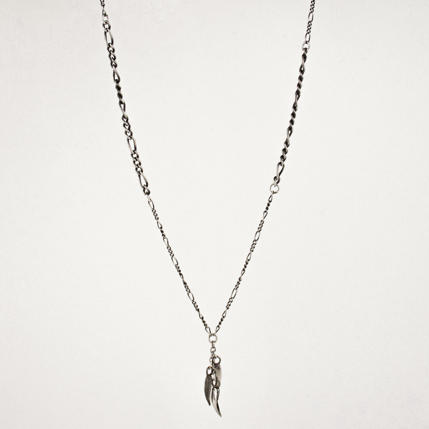 Three solid reclaimed sterling silver claws 0.25 inch in length on adjustable 16 - 20 inch sterling Figaro mixed-chain handmade and finished in our Catskills store-studio.