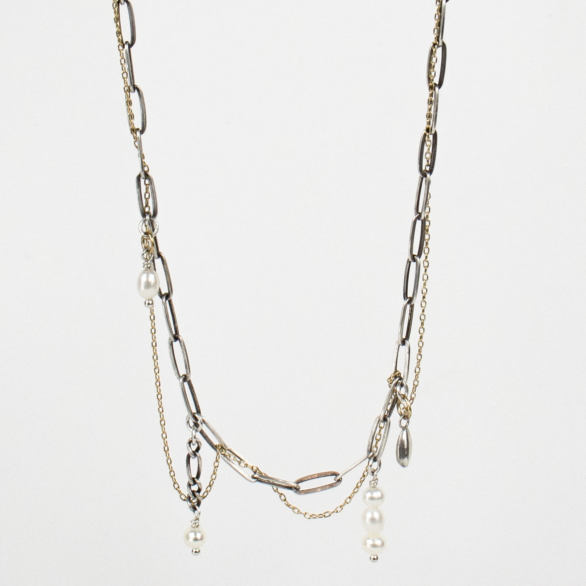 Tangled fine gold-filled and sterling silver paperclip chains with hand-beaded pearl drop-chains and solid reclaimed sterling silver seed charm adjustable 16 - 20 inches and finished in our Catskills store-studio.