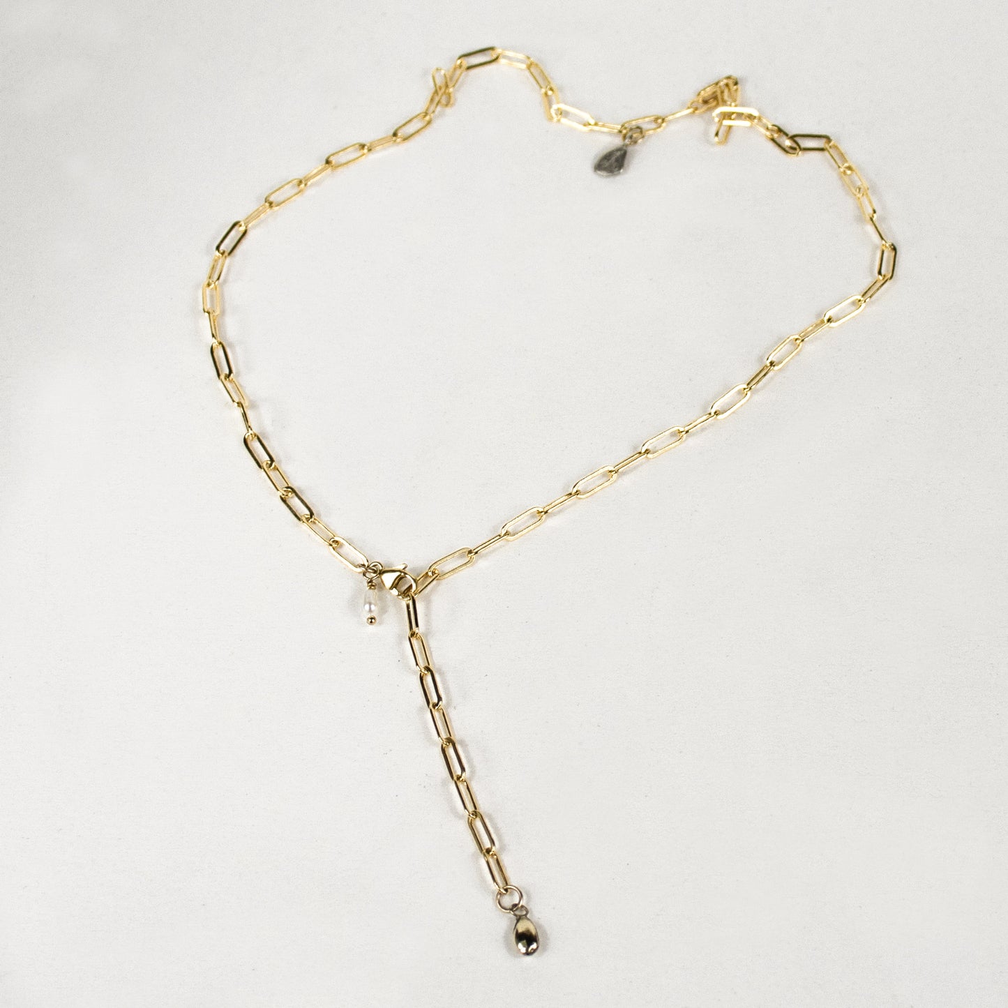 Reclaimed 10k gold seed with a freshwater pearl on a gold-filled paperclip chain choker with a sterling signature Kria tag and adjustable 14 - 18 inches handmade and finished in our Catskills store-studio.