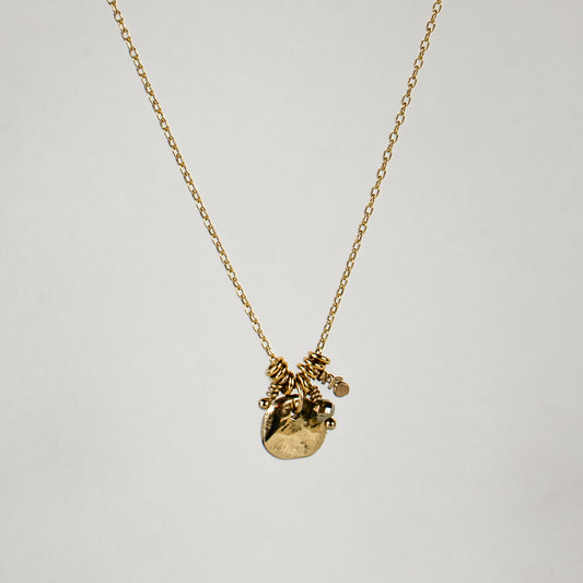 Solid reclaimed 10k gold rock and jump-rings on 16 inch fine gold-filled chain hand-beaded with a pyrite bead and finished in our Catskills store-studio.