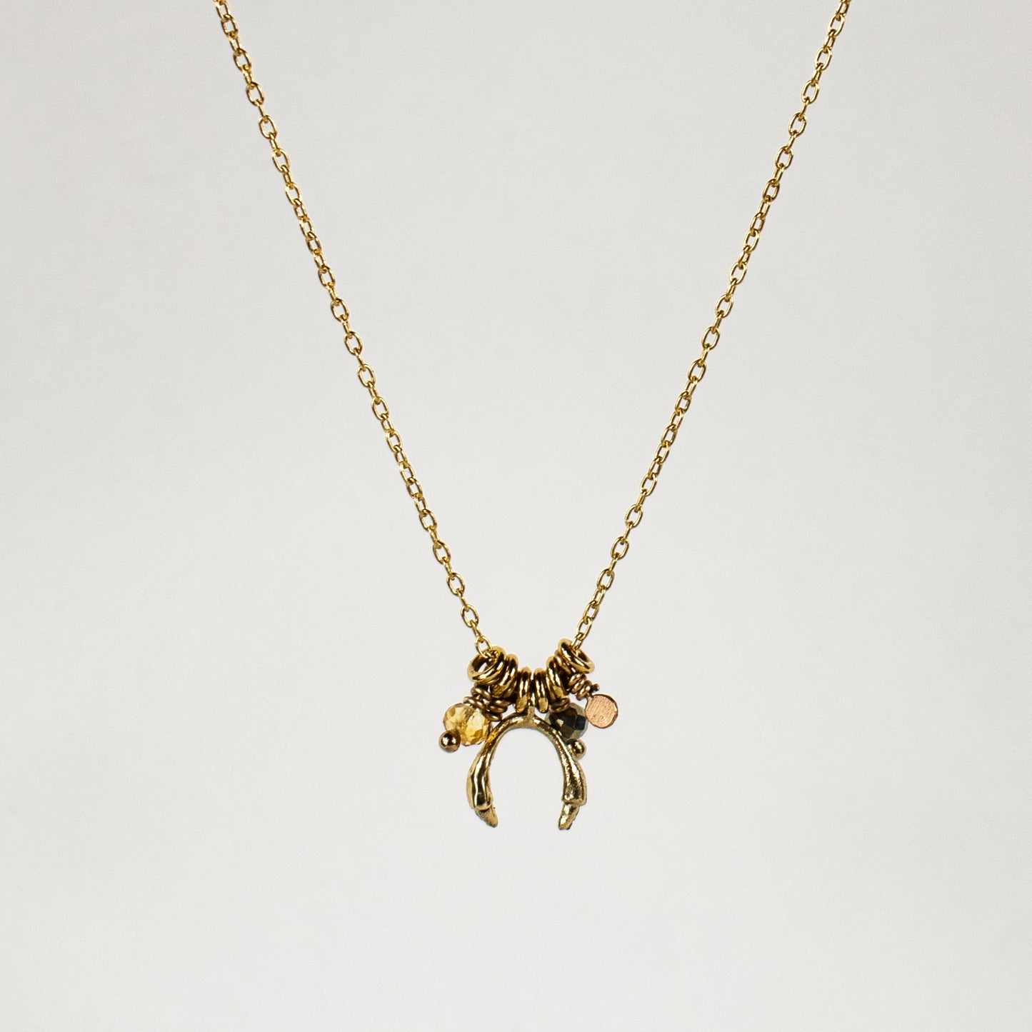 Solid reclaimed 10k gold horseshoe and jump-rings on 16 inch fine gold-filled chain hand-beaded with citrine and pyrite and finished in our Catskills store-studio.