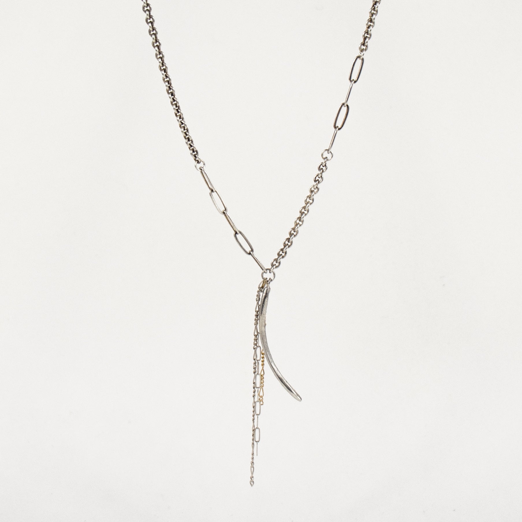 Arc charm measuring 1.5 inches available in sterling silver or brass with sterling and gold-filled tassels on heavy sterling silver mixed-chain adjustable 16-18 inches handmade and finished in our Catskills store-studio