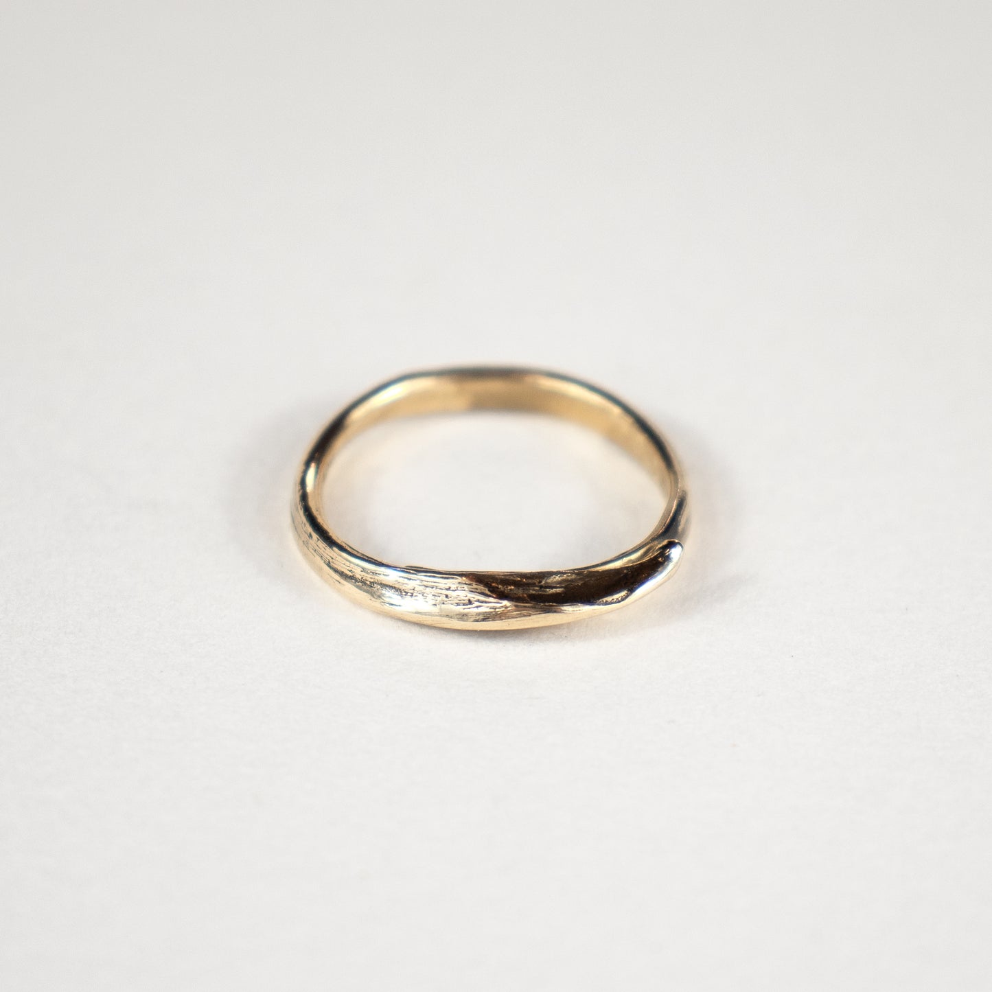 Solid reclaimed 10k gold wraparound fishbone ring adjustable to sizes 5.5 - 9.5 and handmade and finished in our Catskills store-studio by Icelandic designer, Johanna Methusalemsdottir.