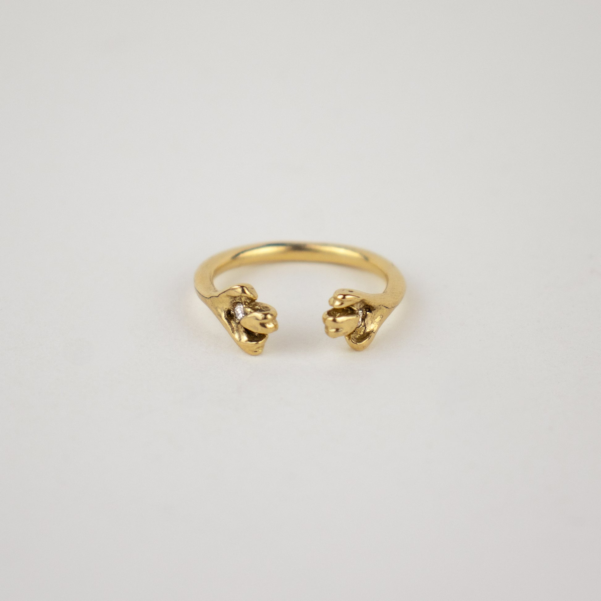 Solid reclaimed 14k gold femur ring set with two 2mm diamonds and adjustable for ring sizes 5 to 6.5 made-to-order and finished in our Catskills store-studio.