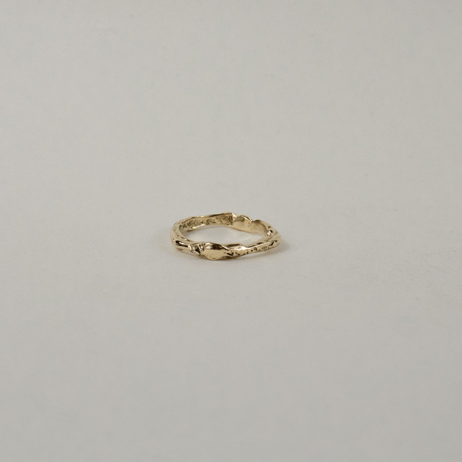 Melted 10k gold thin band also available in sterling silver handmade and finished in our Catskills store-studio