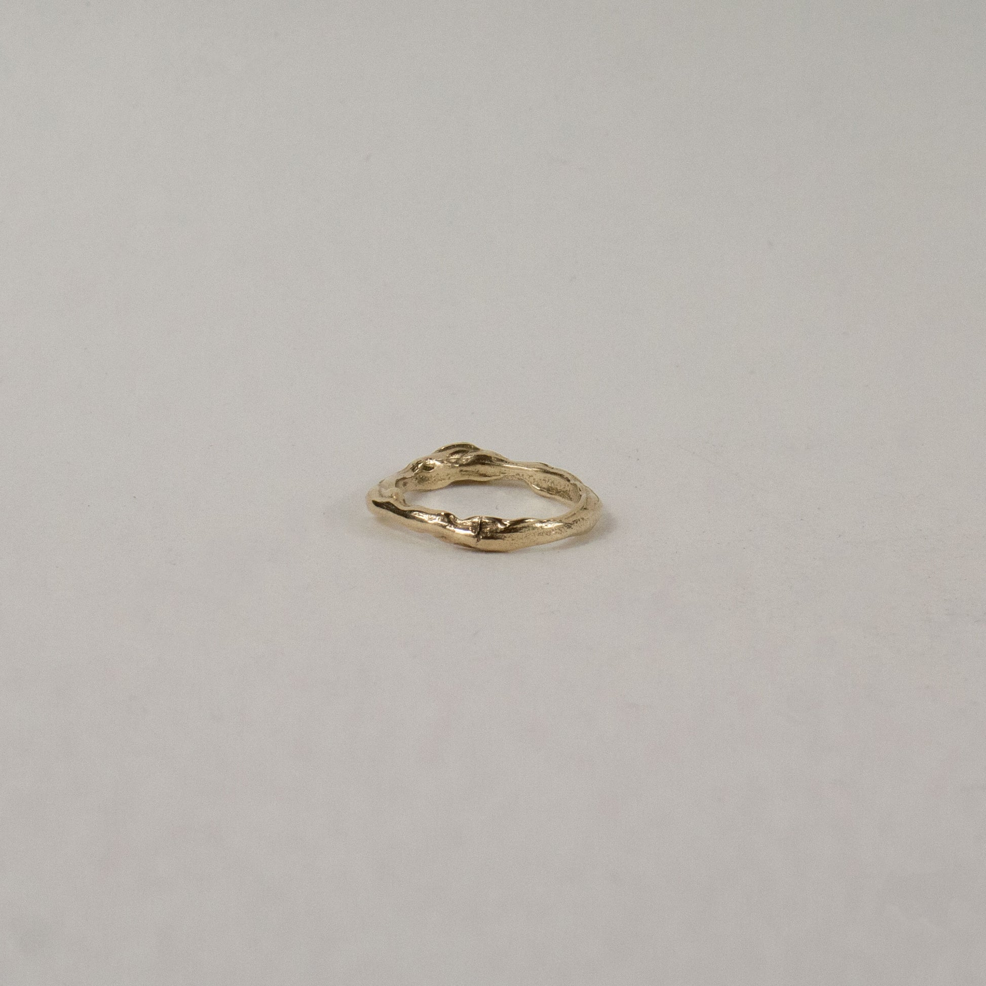 Melted 10k gold thin band also available in sterling silver handmade and finished in our Catskills store-studio
