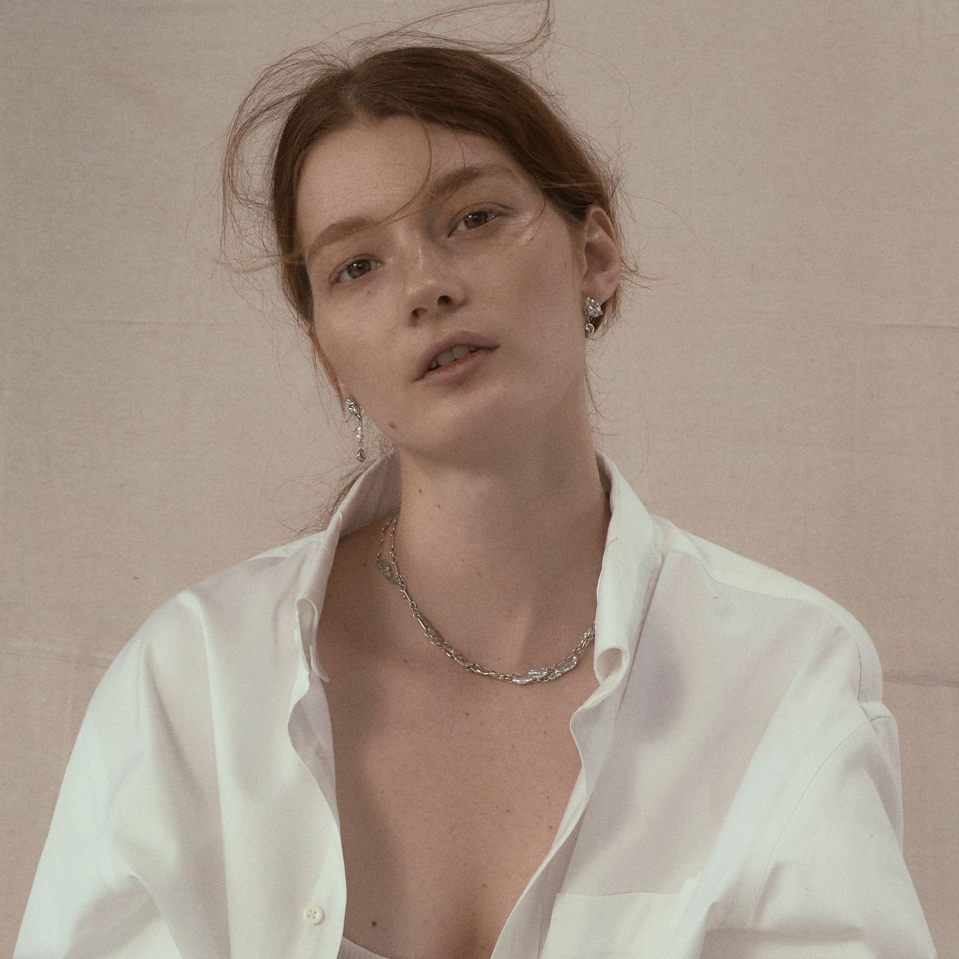 Reclaimed sterling silver asymmetrical seaweed pods dangling from sterling studs and beaded with freshwater pearls 1 and 1.5 inches each handmade and finished in our Catskills store-studio