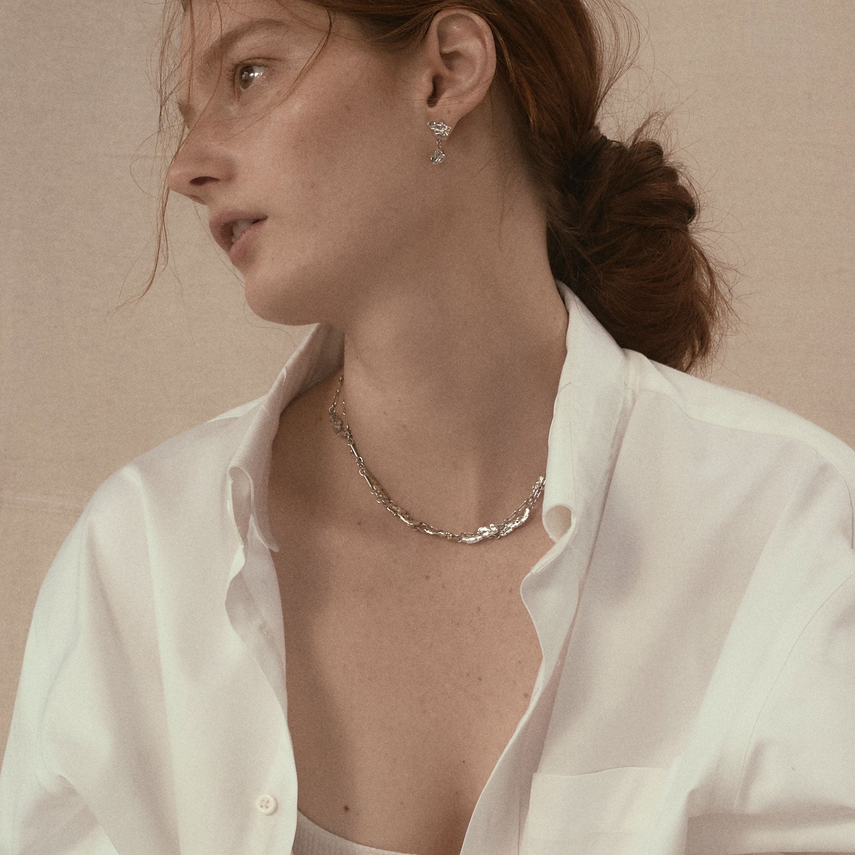 Two sterling silver and one brass seaweed piece measuring 1 inch in length each on sterling chain adjustable from 16 to 18 inches handmade and finished in our Catskills store-studio