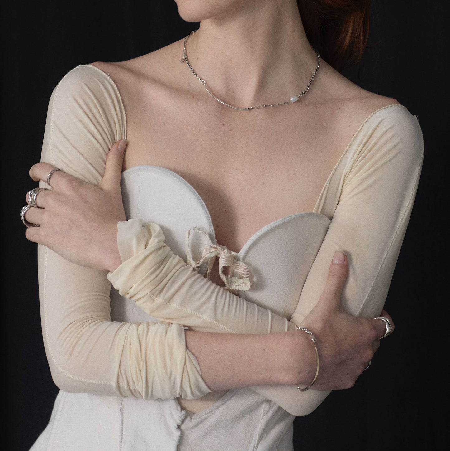 Arc charm measuring 2 inches in length available in reclaimed sterling silver or brass on a gold-filled and sterling mixed-chain bracelet handmade and finished in our Catskills store-studio