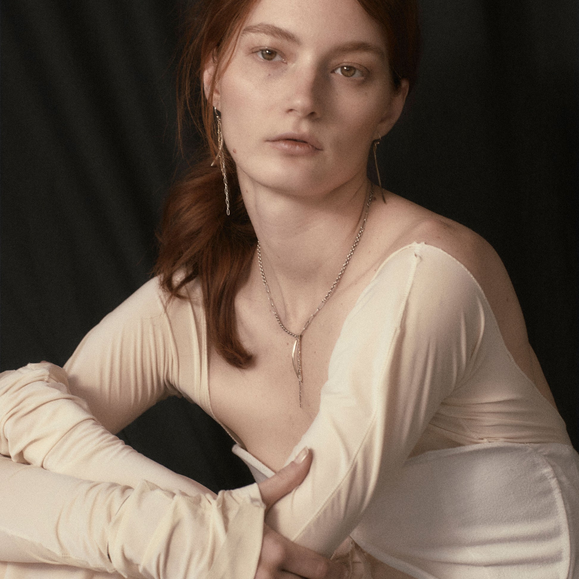 Arc charm measuring 1.5 inches available in sterling silver or brass with sterling and gold-filled tassels on heavy sterling silver mixed-chain adjustable 16-18 inches handmade and finished in our Catskills store-studio