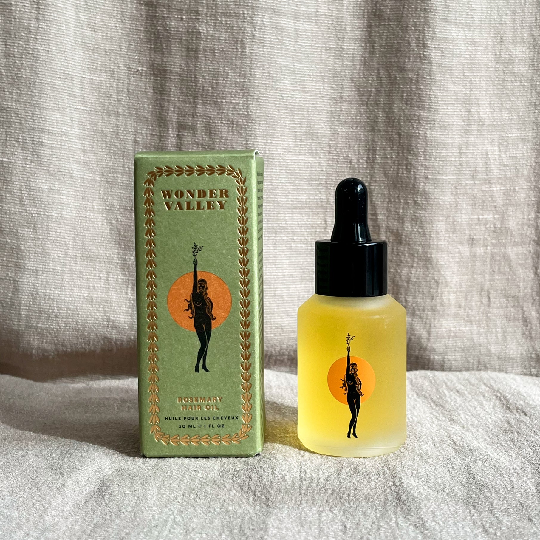 WONDER VALLEY ROSEMARY HAIR OIL. Use daily as a finishing oil or once or twice a week as a pre-wash treatment oil. Boosts shine, tames frizz, helps to strengthen and repair, assists in detangling, supports scalp health, and treats a dry scalp.