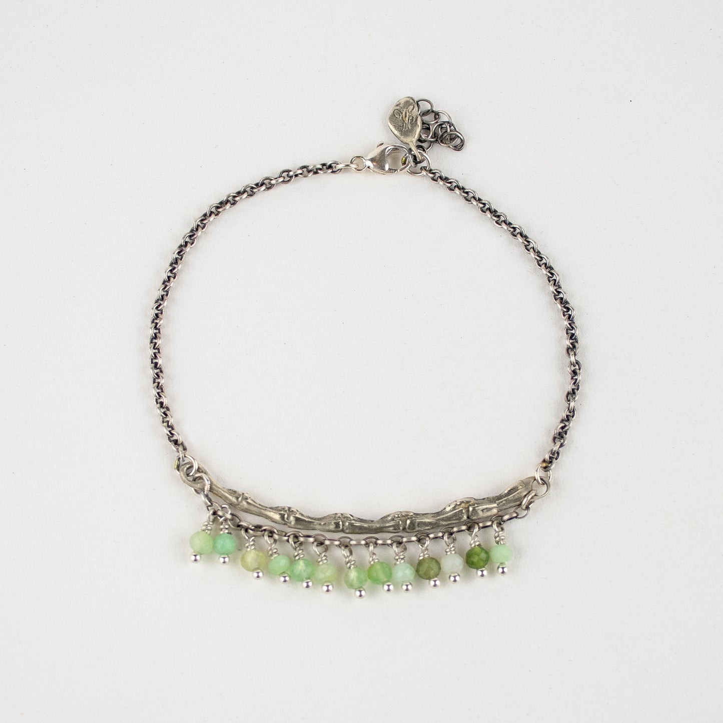 Sterling silver spine 2 inches in length on sterling silver cable-chain hand-beaded with chrysoprase.