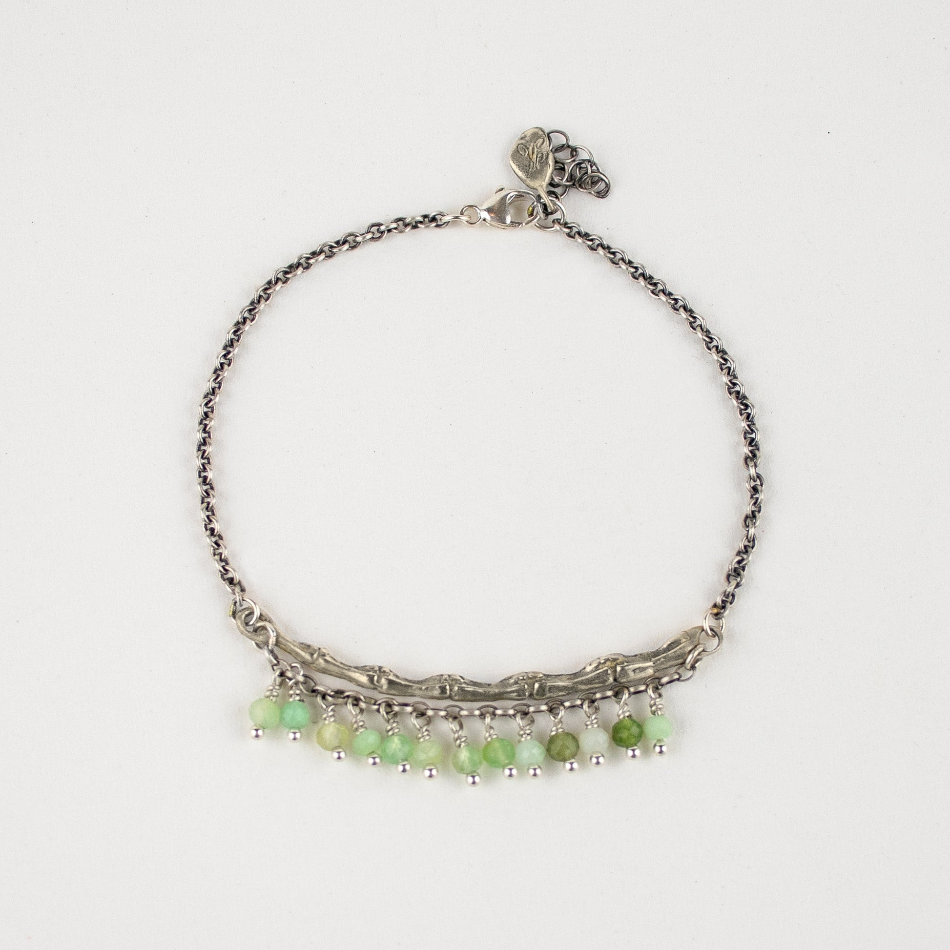 Sterling silver spine 2 inches in length on sterling silver cable-chain hand-beaded with chrysoprase.