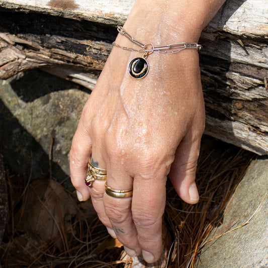 Enameled solid reclaimed 10k gold Roped Horseshoe charm 15 mm in diameter in your choice of black, lemon cream, or fire red enamel on sterling silver paperclip mixed-chain handmade and finished in our Catskills store-studio.