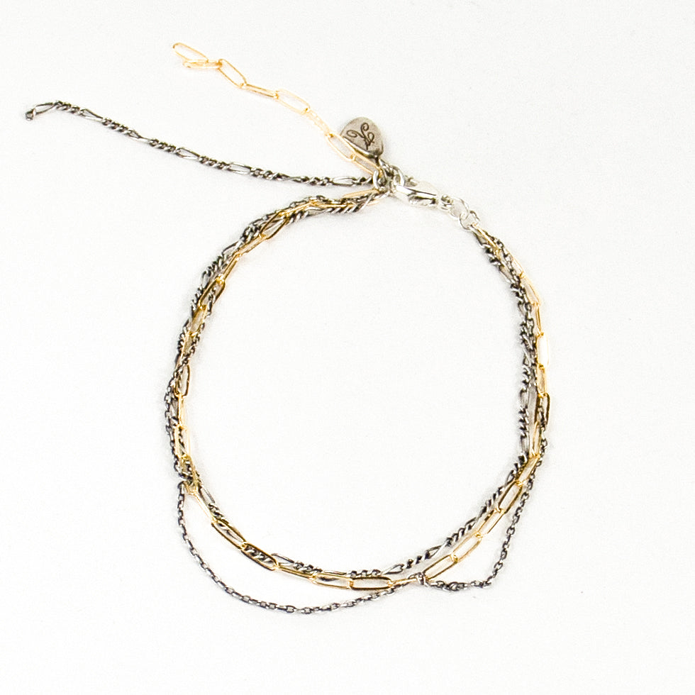 Fine, tangled gold-filled and sterling silver mixed-chains 7 inches in diameter and handmade and finished in our Catskills store-studio.