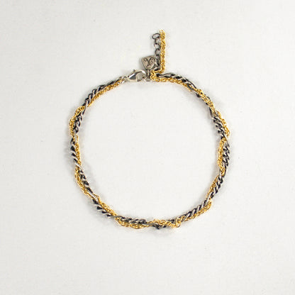 Hand-threaded reclaimed sterling silver and gold-filled mixed-chain bracelet 7 inches in diameter with our signature sterling silver Kria tag handmade and finished in our Catskills store-studio.