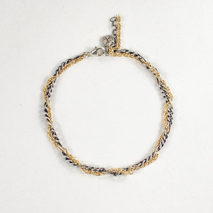 Hand-threaded sterling silver and gold-filled mixed-chain bracelet 7 inches in diameter with our signature sterling silver Kria tag