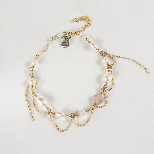 Gold-filled mixed-chain bracelet 7 inches in diameter hand-beaded with freshwater pearls and pink tourmaline bead threaded with gold-filled fine chain handmade and finished in our Catskills store-studio.