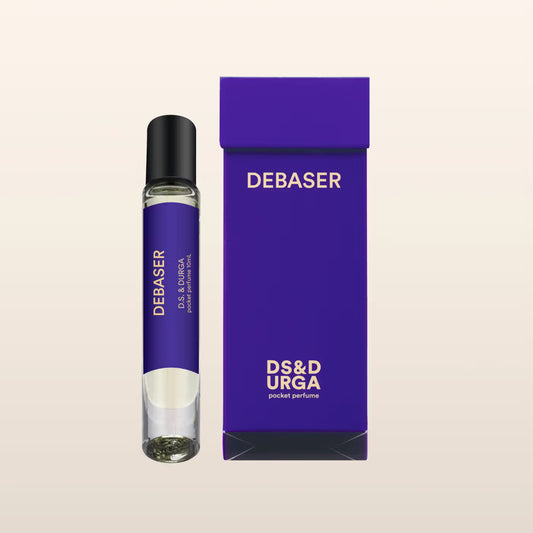 D.S. & DURGA's oil-based pocket perfume is made in New York and ready to go anywhere. Top notes of bergamot, green leaf, pear stem, fig coupled with coconut and iris and a base of tanaka, moss, and blond woods in a 10 ml glass bottle roll-on.