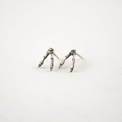 Solid reclaimed sterling silver double-branch stud earrings handmade and finished in our Catskills store-studio.