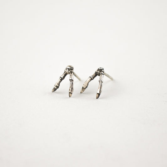 Solid reclaimed sterling silver double-branch stud earrings handmade and finished in our Catskills store-studio.