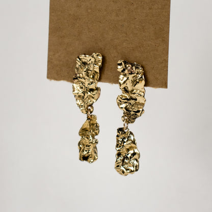 Reclaimed brass double-wave seaweed stud earrings measuring 2 inches in length with sterling silver posts handmade and finished in our Catskills store-studio.