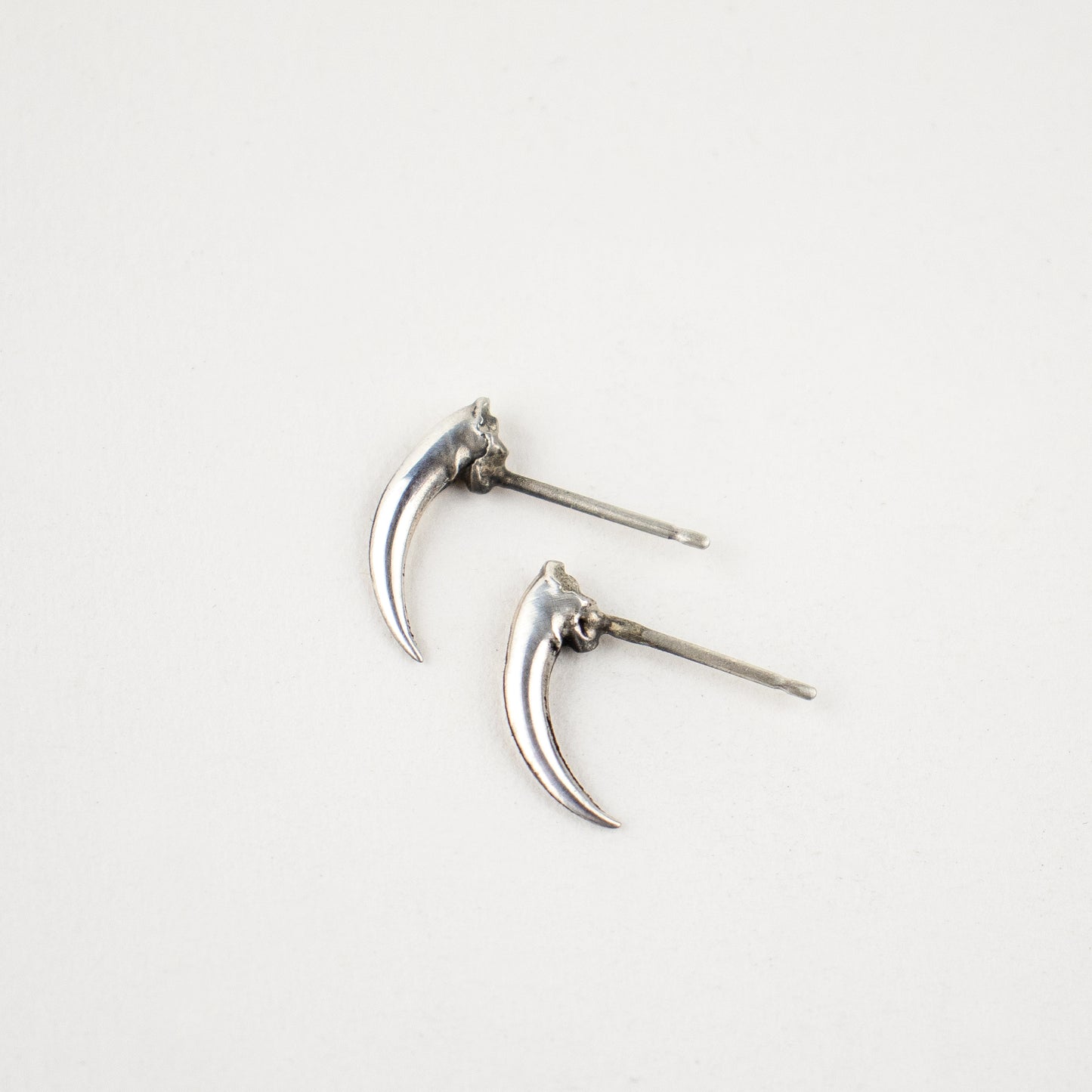 Solid reclaimed sterling silver Icelandic owl claw stud 0.75 inches in length on sterling posts handmade and finished in our Catskills store-studio and available as singles to mix-and-match.