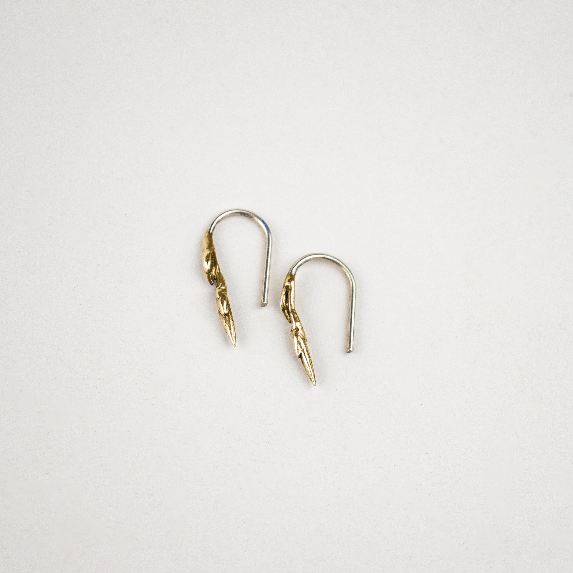 Solid reclaimed 10k gold branch-bud 0.75 inch earrings with sterling silver stems handmade and finished in our Catskills store-studio.