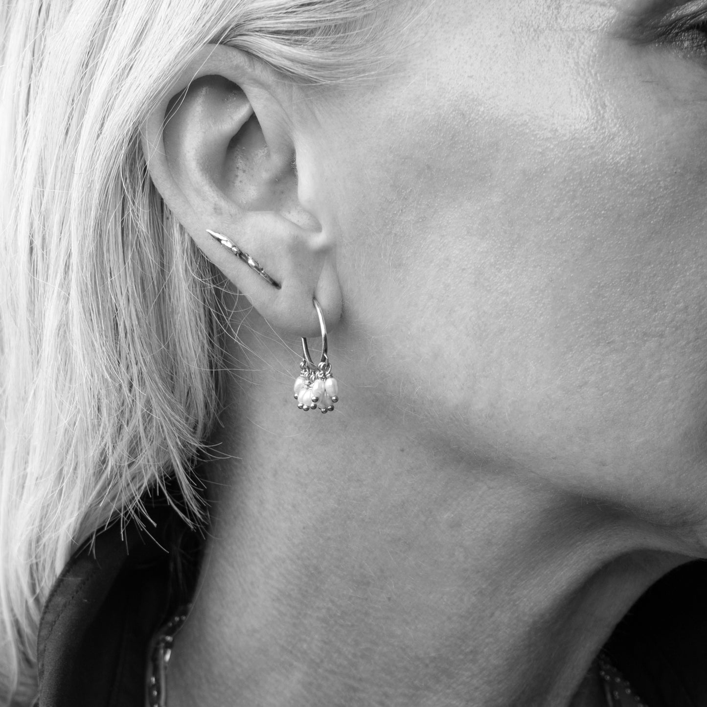 Solid reclaimed 10k gold branch-bud 0.75 inch earrings with sterling silver stems handmade and finished in our Catskills store-studio shown on model.