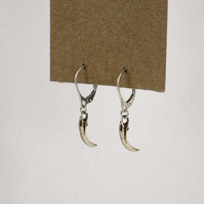 Solid reclaimed sterling silver or brass Icelandic 0.75 inch owl claws on sterling hoops finished in our Catskills store-studio and available as singles to mix-and-match.