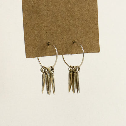 Four solid reclaimed sterling silver and three brass 0.5 inch snake-spikes on handmade sterling hoops handmade and finished in our Catskills store-studio and available as singles to mix-and-match