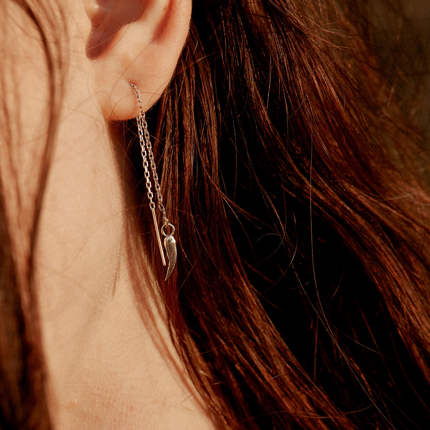 Solid reclaimed 10k gold claw charms on gold-filled fine-chain threaders handmade and finished in our Catskills store-studio shown on model.