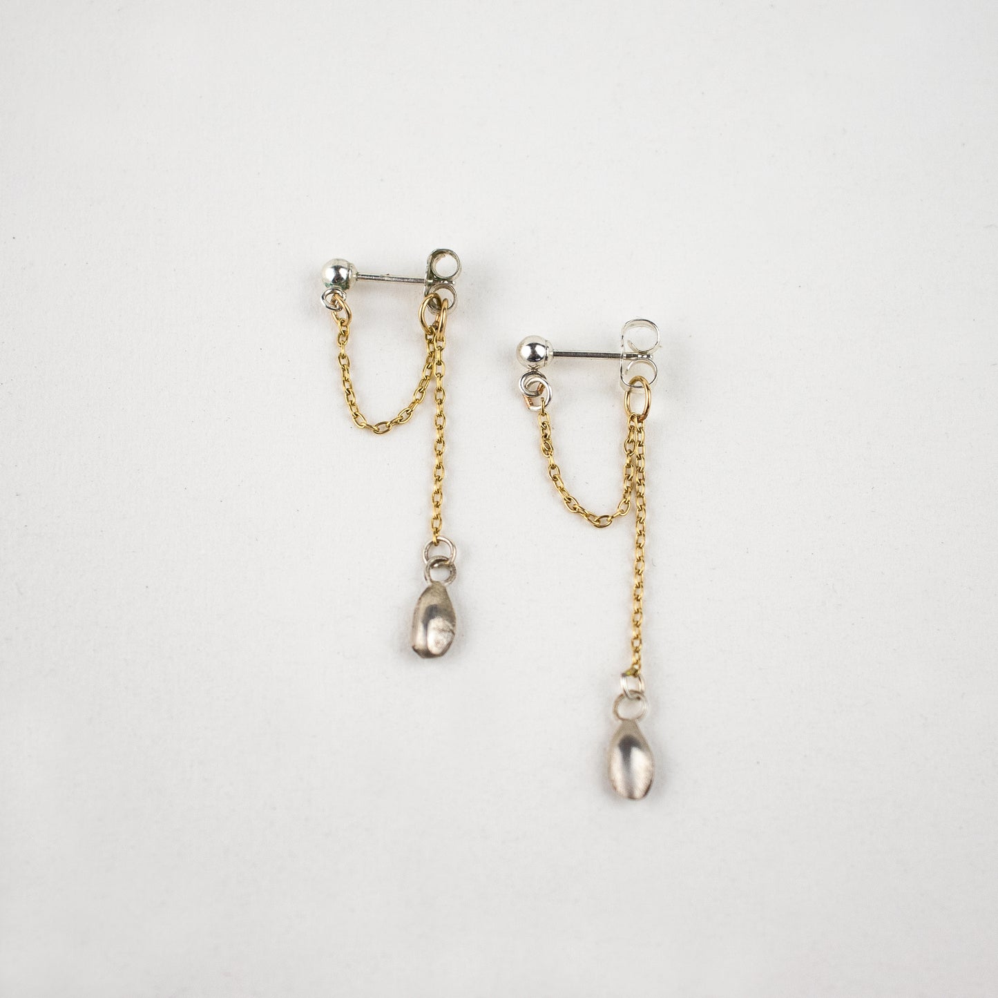 Reclaimed solid sterling silver seed and gold-filled chain dangle studs handmade and finished in our Catskills store-studio.