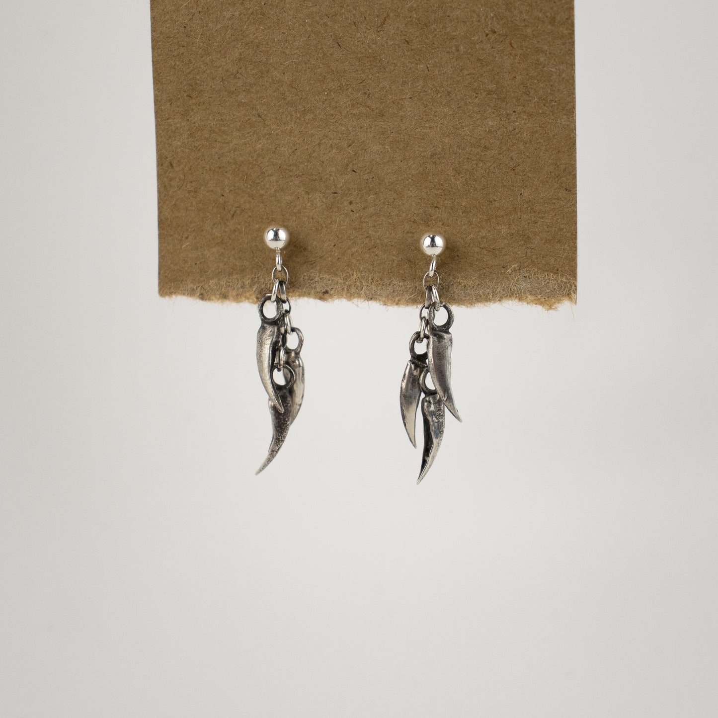 Three solid reclaimed sterling silver claw tassel on sterling studs handmade and finished in our Catskills store-studio and available as singles to mix-and-match.