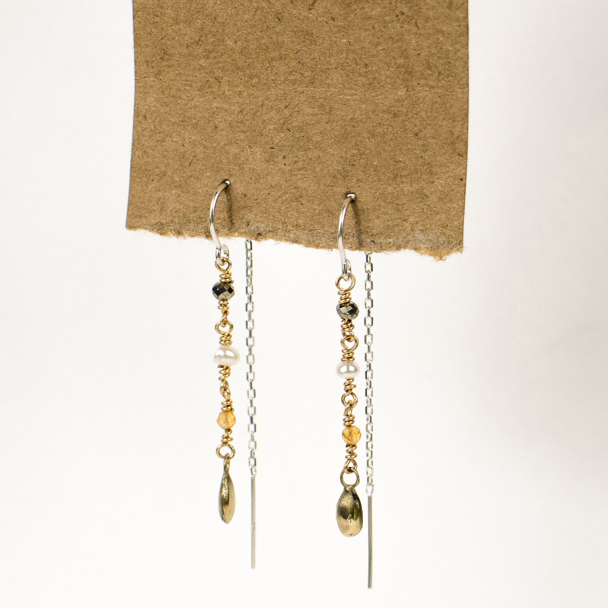 Reclaimed sterling silver and gold-filled wire threader earrings beaded with citrine, pyrite and one freshwater pearl and available with either 10k gold or sterling silver seed charms.