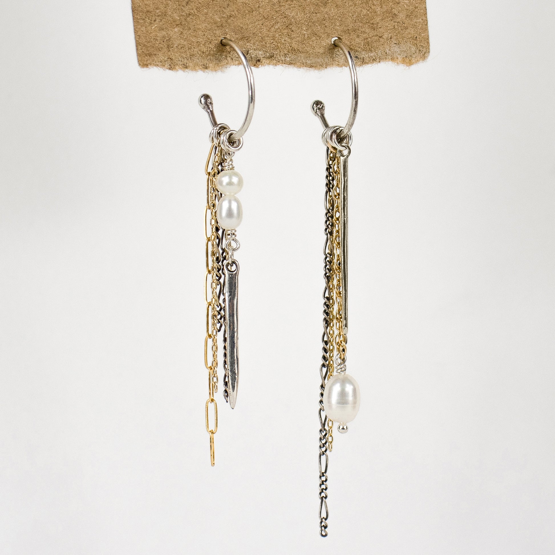 Solid reclaimed sterling silver spikes with gold-filled and sterling mixed-chains and freshwater pearls on sterling hoops approximately 1.5 inches in diameter cast with reclaimed precious metals and handmade in the Catskills by Icelandic designer, Johanna Methusalemsdottir.